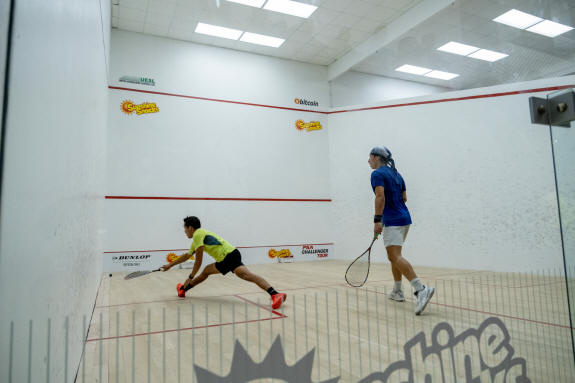 Andres Herrera and Leo Vargas on court in Port of Spain