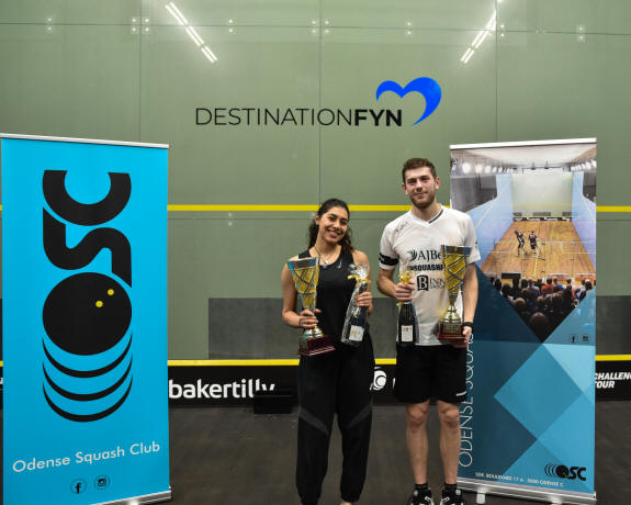 Malak Khafagy and Rory Stewart collect the Odense Open trophies