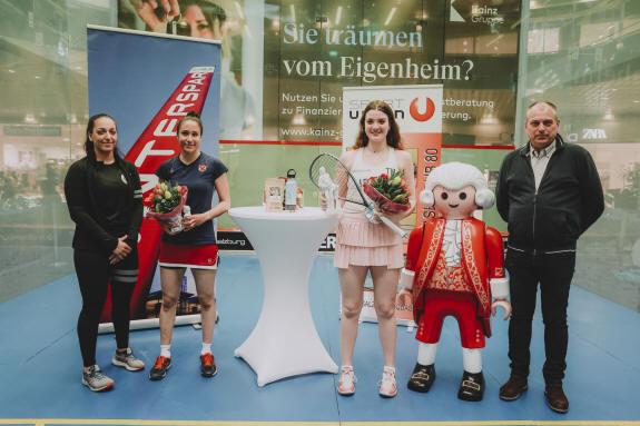 Torrie Malik (centre right) with the Mozart Open trophy