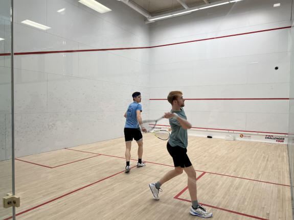 Simon Herbert plays a forehand shot during his MRU Open semi-final with Curtis Malik