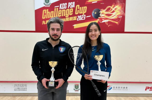 Abdullah Almezayen (left) and Aira Azman (right) with the KCC Challenge Cup trophies