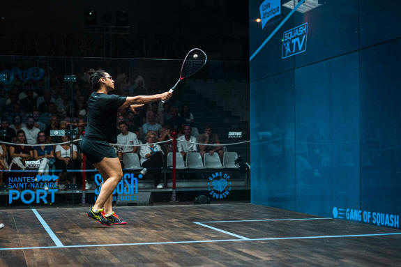 Kenzy Ayman plays a backhand shot during her first round match at the Open de France de Squash