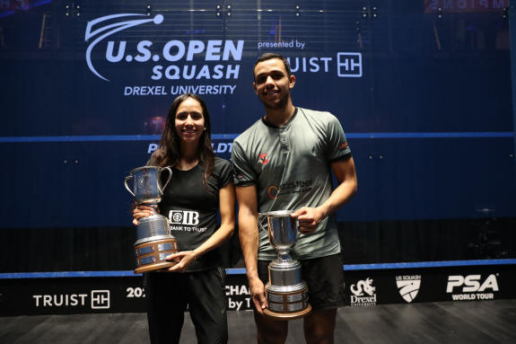 Mostafa Asal and Nouran Gohar with the U.S. Open trophies