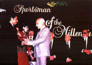 PIA MD Mr Ali Khan Abbassi presents the award
